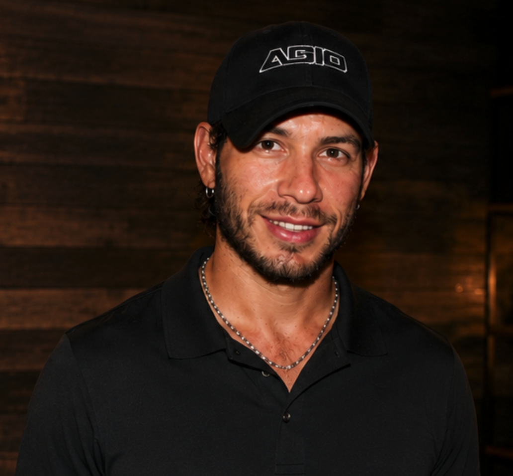 Drew wearing a black cap